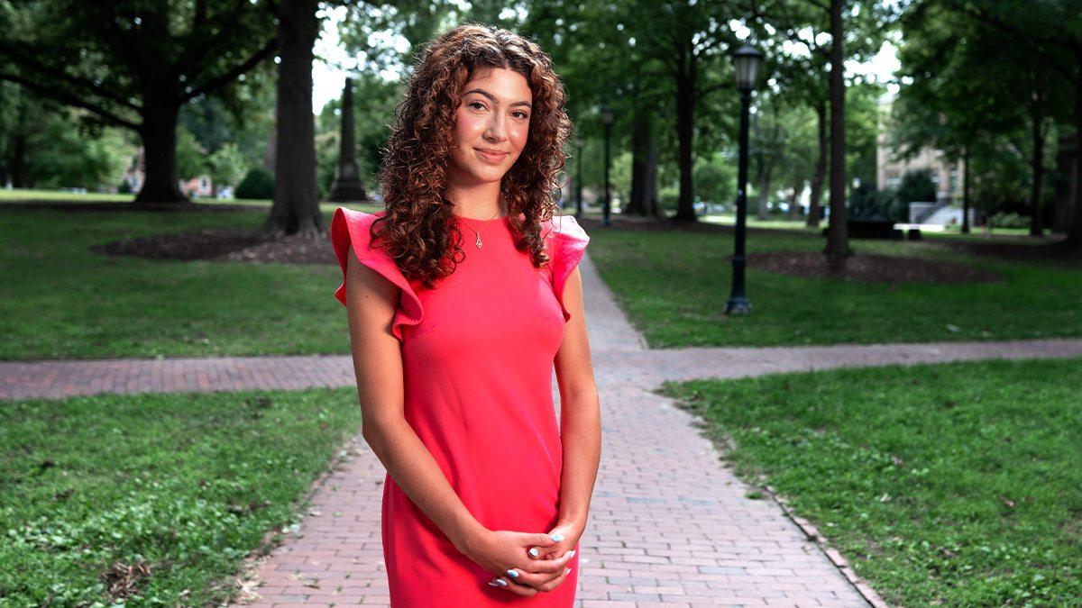 Portrait of Carolina first-year student Tazanna Jones on McCorkle Place on the University's campus.